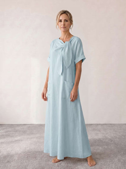 Vestido midi fluido con lazada al cuello