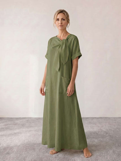 Vestido midi fluido con lazada al cuello